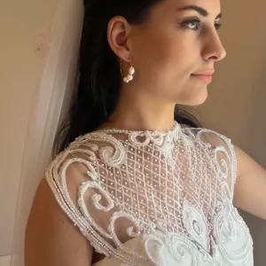 Sophia Pearl Earrings being modeled by a bride