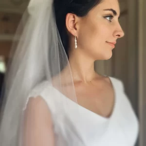 Lydia Pearl Earrings being modeled on a bride