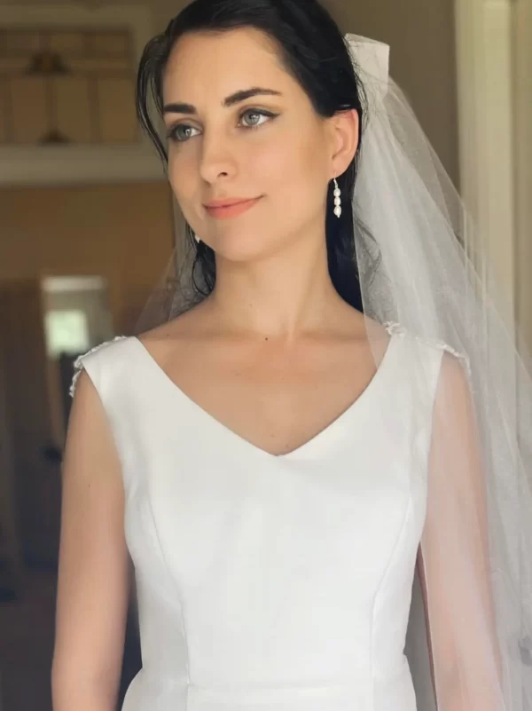 Lydia Pearl Earrings being modeled by a bride